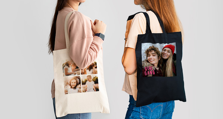 Two models carrying a white and a black photo-printed canvas tote