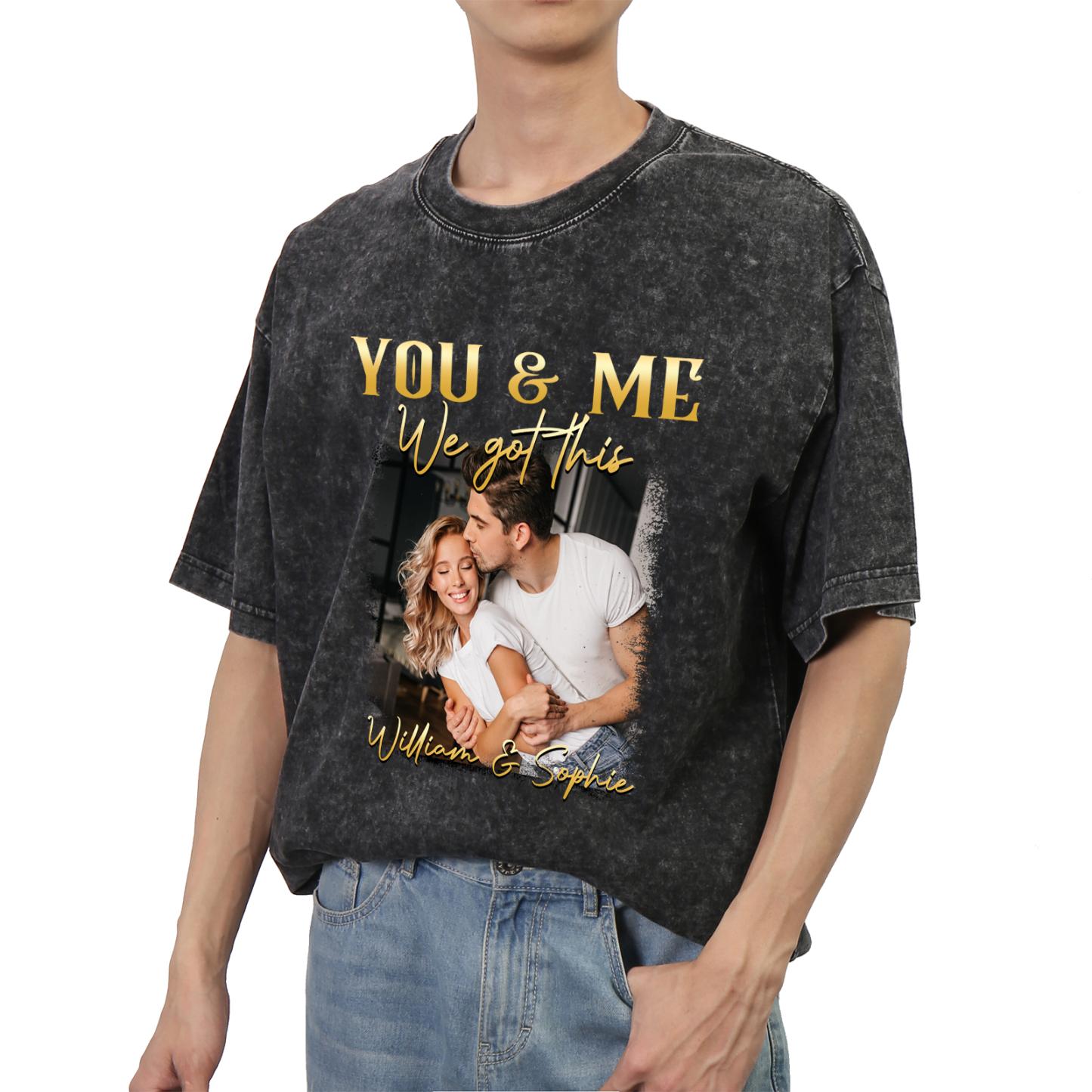 Vintage-wash black tee with a couple photo and gold lettering