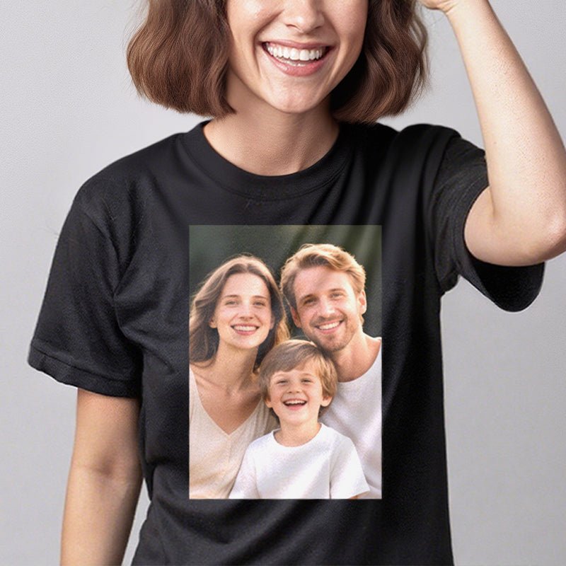 Woman wearing a black t-shirt with a full-colour family photograph printed on the chest